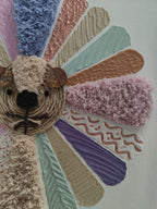 Détail textures laine corde tableau lion enfant 
